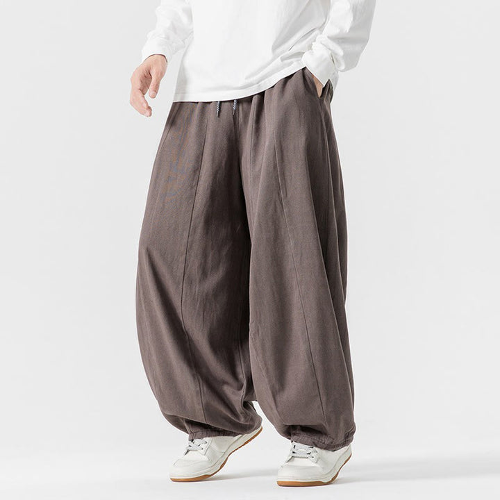 Pantalon en coton à jambes larges avec poches, motif Buddha Stones, idéal pour les trajets d'hiver. - image 29