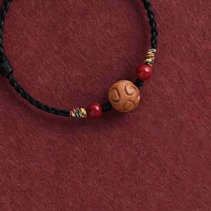 Bracelet porte-bonheur en corde de bois de pêcher naturel sculpté dans des Buddha Stones , orné d'un motif de bon augure - image 14