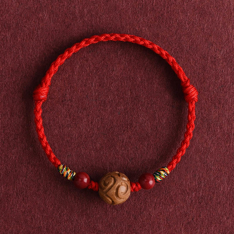 Bracelet porte-bonheur en corde de bois de pêcher naturel sculpté dans des Buddha Stones , orné d'un motif de bon augure - Cordon rouge (Tour de poignet : 13-18 cm) - image 1