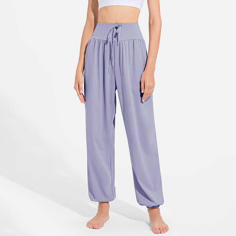 Pantalon harem femme Buddha Stones uni à taille élastique et cordon de serrage, avec poches, idéal pour le sport et le yoga. - image 1