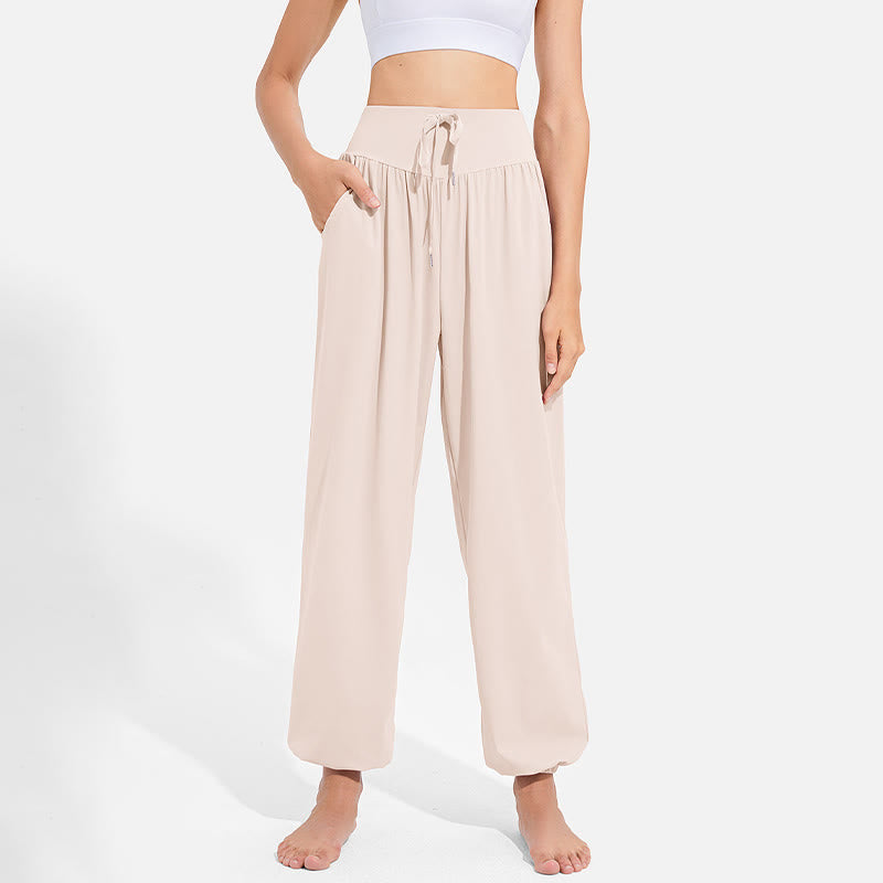 Pantalon harem femme Buddha Stones uni à taille élastique et cordon de serrage, avec poches, idéal pour le sport et le yoga. - image 9