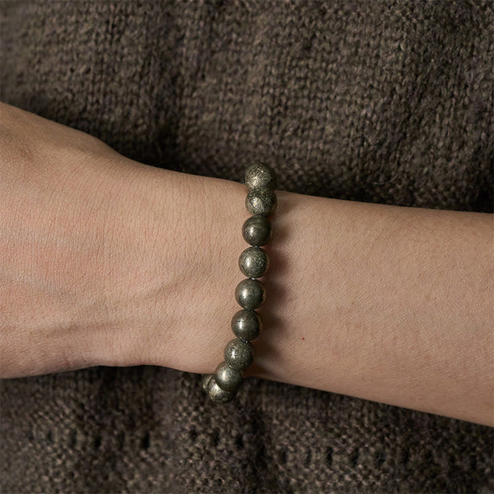 Bracelet de perles rondes en pyrite et Buddha Stones, symbole de confiance et d'abondance - image 4