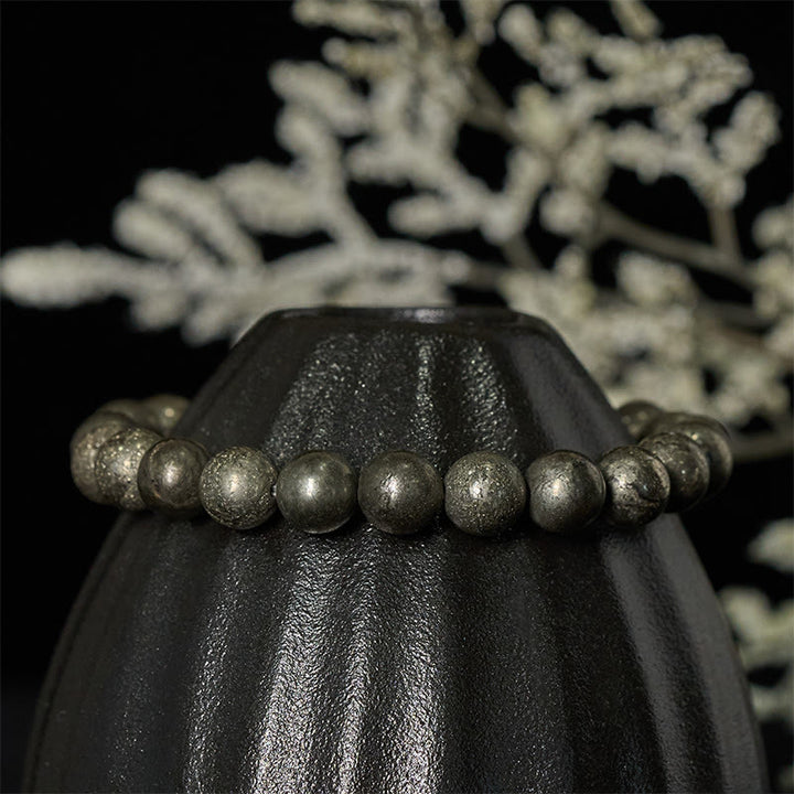 Bracelet de perles rondes en pyrite et Buddha Stones, symbole de confiance et d'abondance - image 2