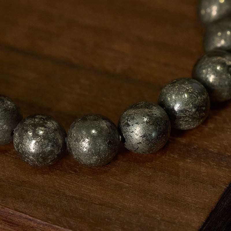 Bracelet de perles rondes en pyrite et Buddha Stones, symbole de confiance et d'abondance - image 3