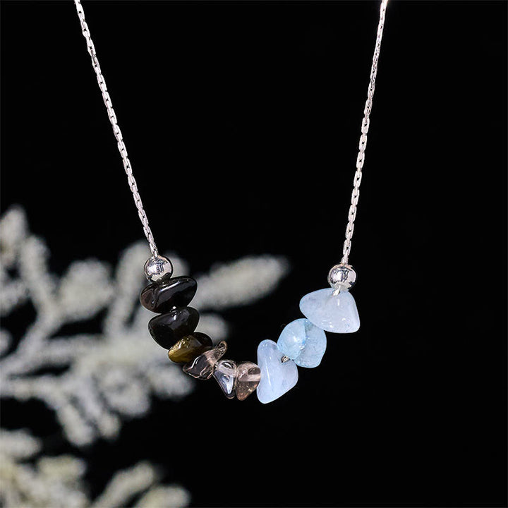 Collier pendentif en cristal rose, orbidine noire, quartz fumé, grenat, aigue-marine et quartz fraise, orné de Buddha Stones et symbole de force. - Obsidienne noire, quartz fumé, aigue-marine - image 0
