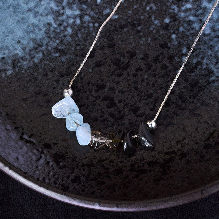 Collier pendentif en cristal rose, orbidine noire, quartz fumé, grenat, aigue-marine et quartz fraise, orné de Buddha Stones et symbole de force. - image 1