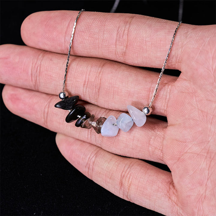 Collier pendentif en cristal rose, orbidine noire, quartz fumé, grenat, aigue-marine et quartz fraise, orné de Buddha Stones et symbole de force. - image 4