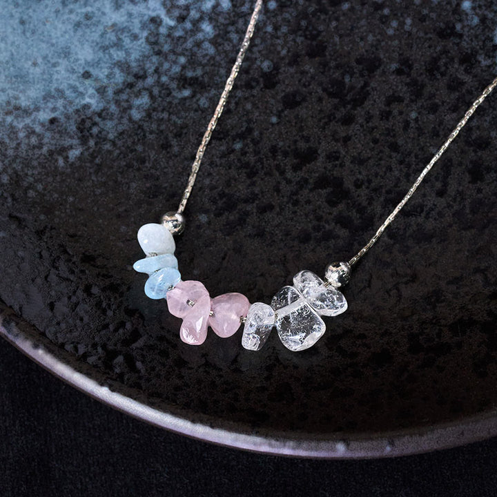 Collier pendentif en cristal rose, orbidine noire, quartz fumé, grenat, aigue-marine et quartz fraise, orné de Buddha Stones et symbole de force. - image 9