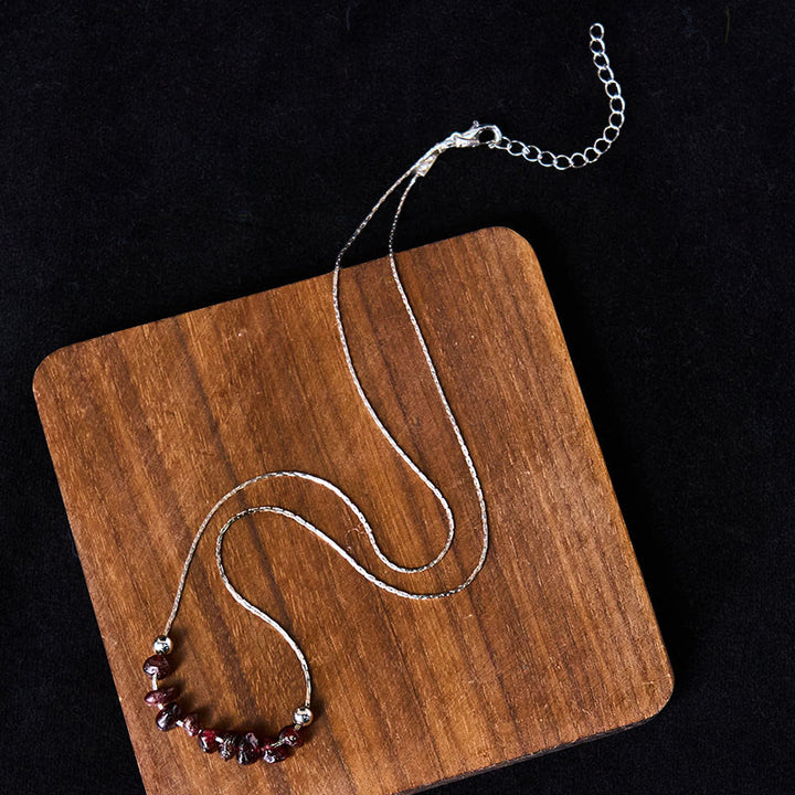 Collier pendentif en cristal rose, orbidine noire, quartz fumé, grenat, aigue-marine et quartz fraise, orné de Buddha Stones et symbole de force. - image 17