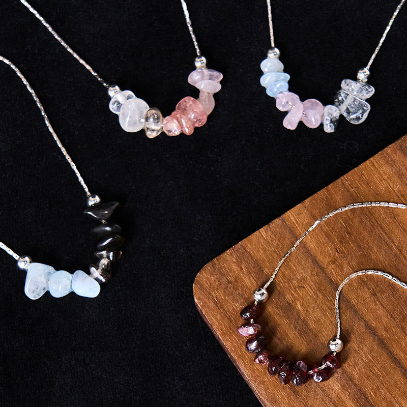 Collier pendentif en cristal rose, orbidine noire, quartz fumé, grenat, aigue-marine et quartz fraise, orné de Buddha Stones et symbole de force. - image 26