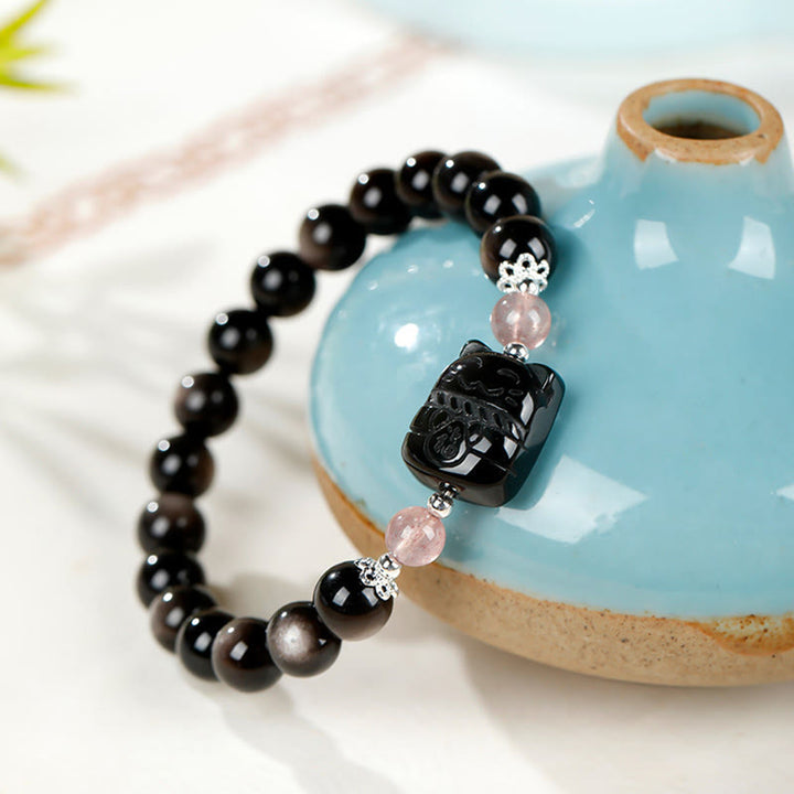 Buddha Stones Bracelet de protection en quartz fraise et obsidienne argentée à reflets chat - image 7