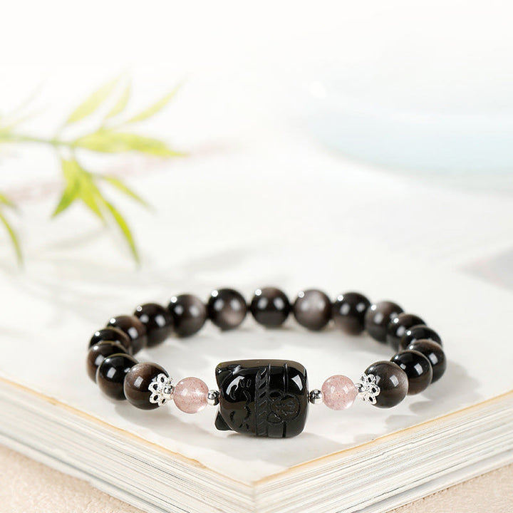 Buddha Stones Bracelet de protection en quartz fraise et obsidienne argentée à reflets chat - image 2