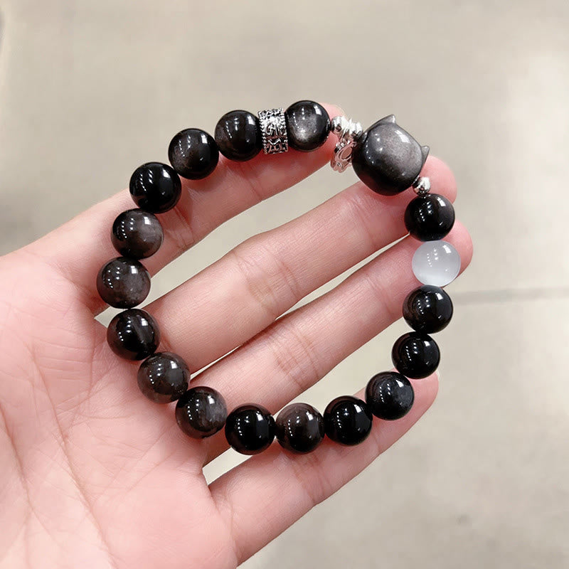 Buddha Stones Bracelet positif en obsidienne œil-de-chat blanc à tête de chat et reflet argenté - Perle d'obsidienne à reflet argenté, taille 10 mm (tour de poignet : 14-15 cm) - image 14