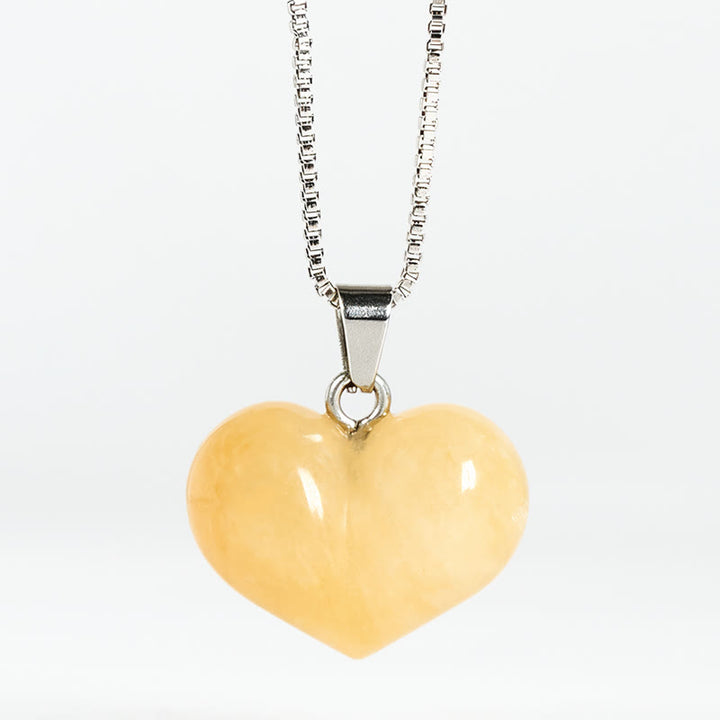 Collier pendentif en forme de cœur Buddha Stones : améthyste, topaze, cristal rose, opale, œil de tigre, cristal blanc, jaspe rouge, amazonite, aventurine verte, obsidienne noire, citrine. - Topaze - image 5