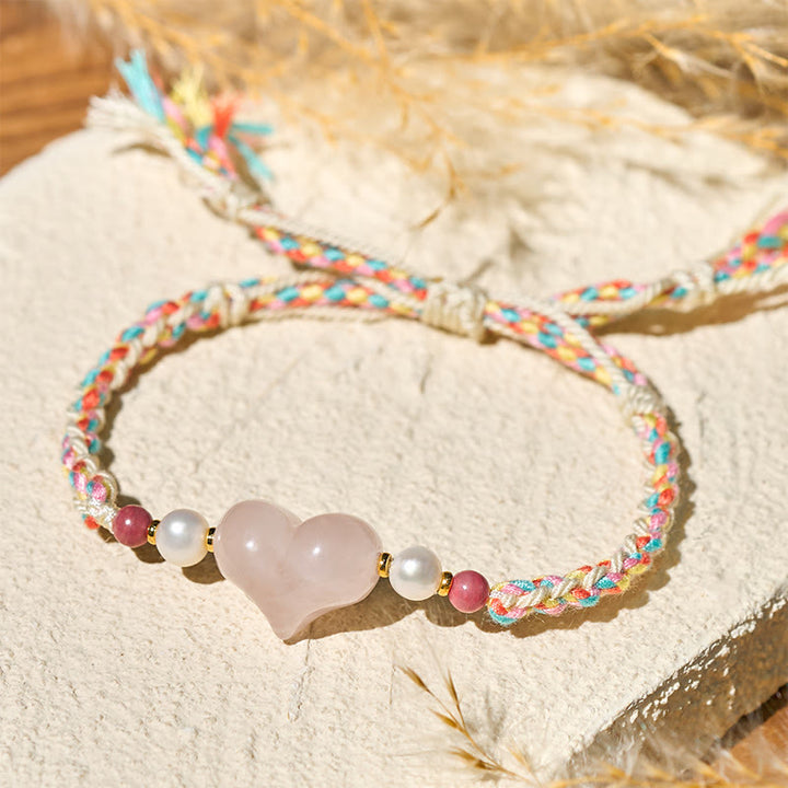 Bracelet en corde tressée rose avec cristal rose et motif cœur en Buddha Stones, symbole de chaleur et d'amour - image 3