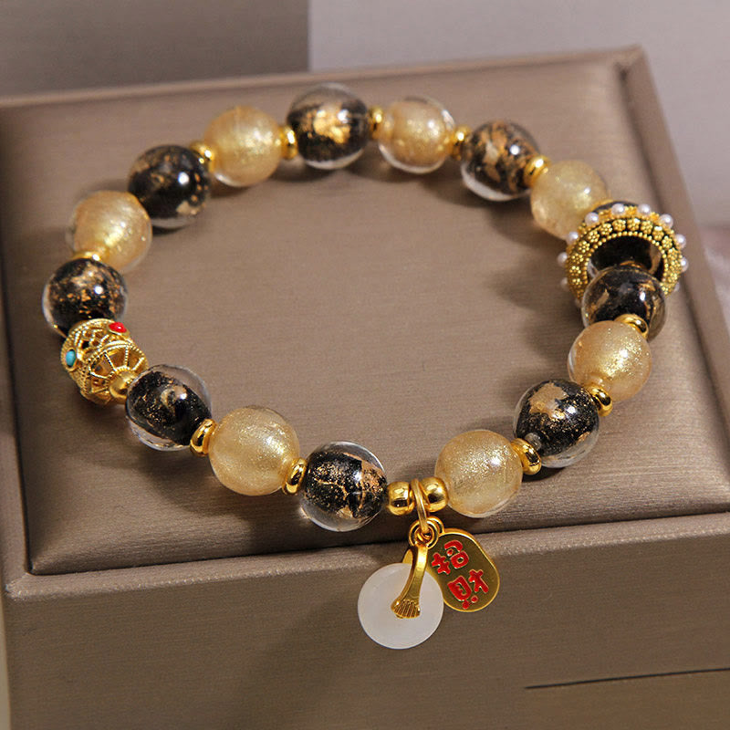 Buddha Stones Bracelet porte-bonheur en perles de verre Liuli noir et or, symbole de richesse et de paix - image 1