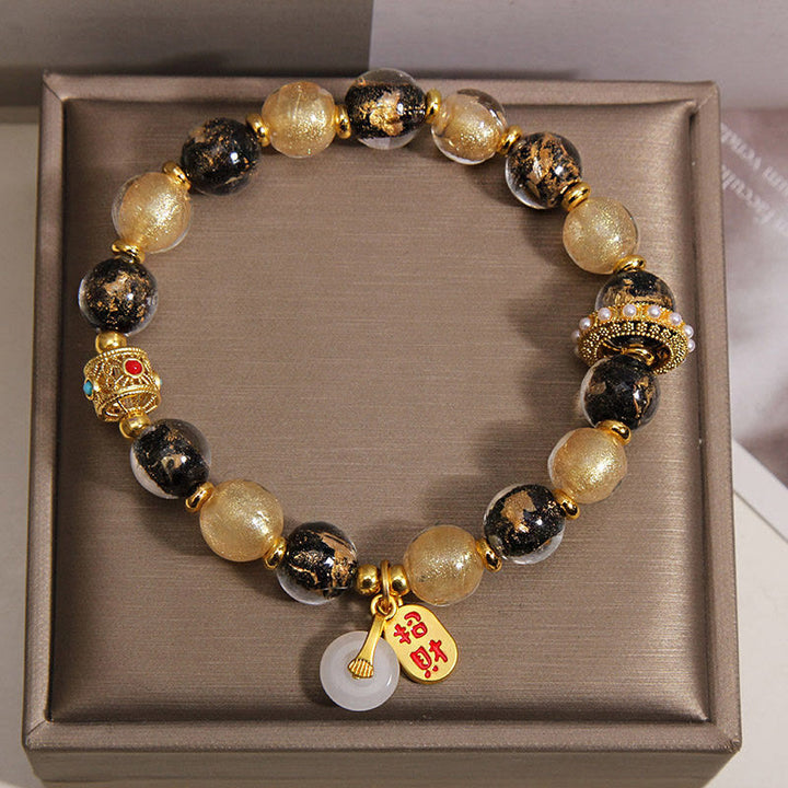 Buddha Stones Bracelet porte-bonheur en perles de verre Liuli noir et or, symbole de richesse et de paix - image 4