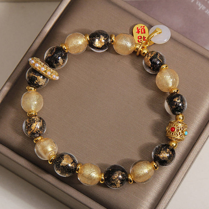 Buddha Stones Bracelet porte-bonheur en perles de verre Liuli noir et or, symbole de richesse et de paix - image 3