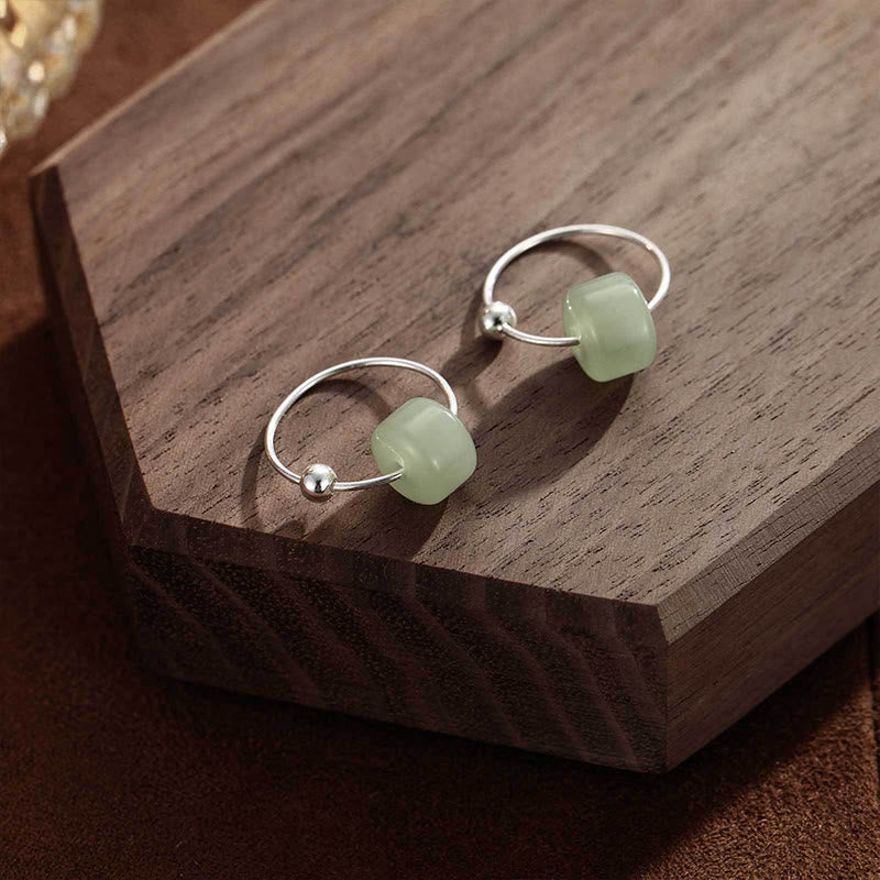 Buddha Stones Boucles d'oreilles en argent sterling 925 et jade Hetian, symboles de prospérité - image 1
