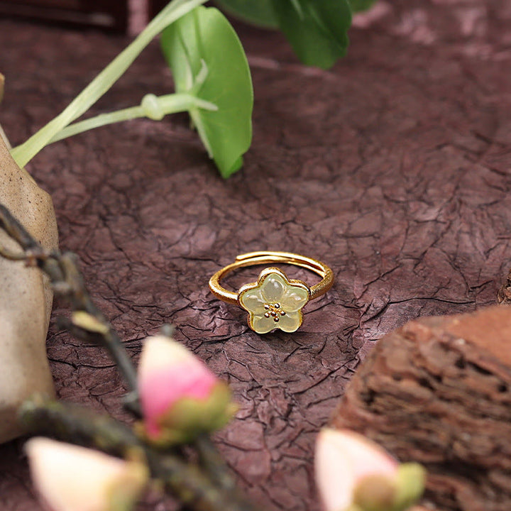 Buddha Stones Bague porte-bonheur en cuivre et jade de Hetian, motif fleurs de prunier - image 1