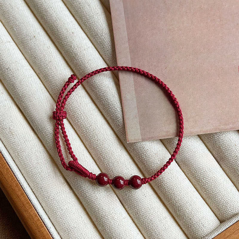 Buddha Stones Bracelet en corde tressée avec perles de cinabre faites à la main, symbole de calme et de bénédiction - image 2
