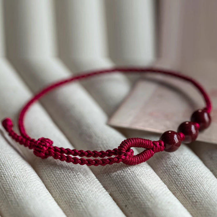 Buddha Stones Bracelet en corde tressée avec perles de cinabre faites à la main, symbole de calme et de bénédiction - image 3