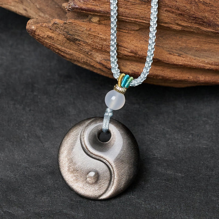 Buddha Stones Collier pendentif en obsidienne argentée, symbole Yin Yang et protection, orné d'un pendentif Yin Yang. - image 1