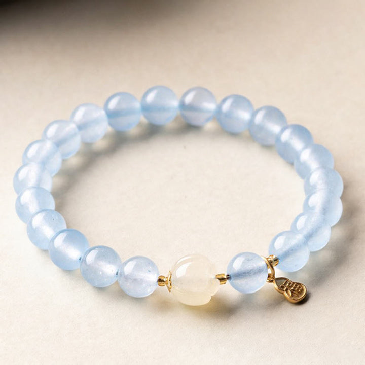 Buddha Stones Bracelet porte-bonheur et de guérison en aigue-marine naturelle à l'effigie du personnage Fu - Morganite aigue-marine 8 mm (Tour de poignet : 14-15 cm) - image 0