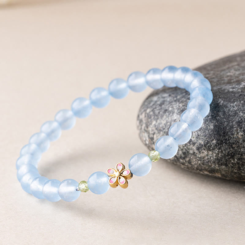 Buddha Stones Bracelet de guérison en cuivre plaqué or et aigue-marine naturelle, orné d'une fleur - image 3