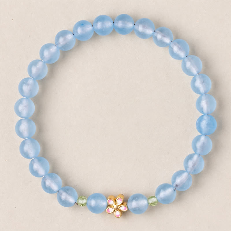 Buddha Stones Bracelet de guérison en cuivre plaqué or et aigue-marine naturelle, orné d'une fleur - image 4