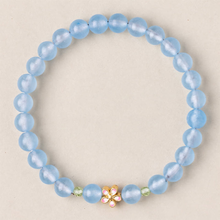 Buddha Stones Bracelet de guérison en cuivre plaqué or et aigue-marine naturelle, orné d'une fleur - image 4