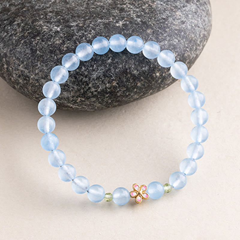 Buddha Stones Bracelet de guérison en cuivre plaqué or et aigue-marine naturelle, orné d'une fleur - image 1
