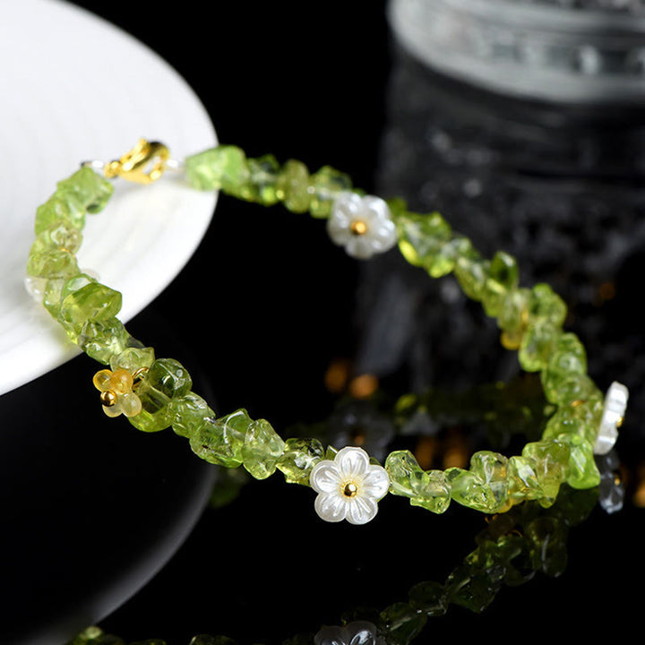 Buddha Stones Bracelet Sérénité en aigue-marine naturelle, péridot, quartz fraise et divers cristaux - image 14