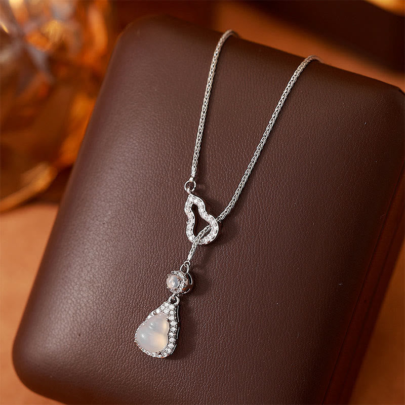 Buddha Stones Pendentif double gourde en calcédoine et cuivre, symbole positif - image 0