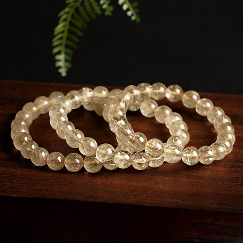 Bracelet de protection et de bonne augure en quartz rutile naturel Buddha Stones - image 4