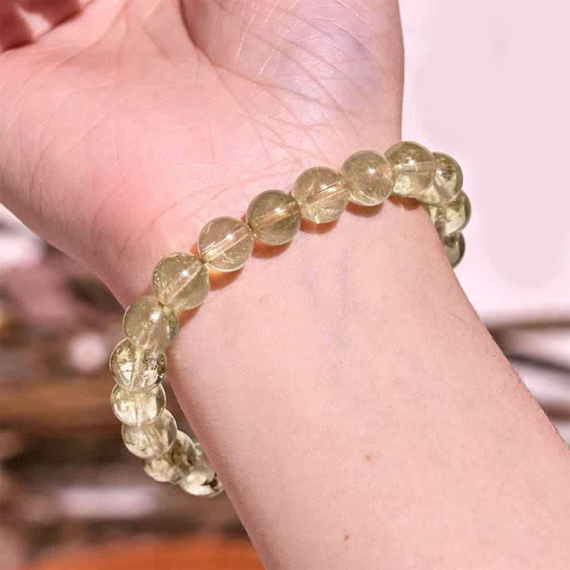 Bracelet de protection et de bonne augure en quartz rutile naturel Buddha Stones - image 8