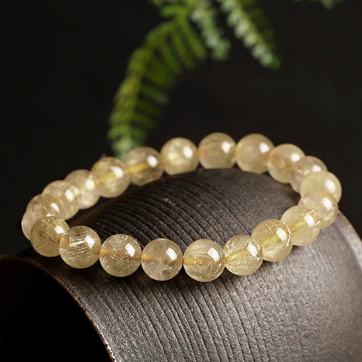 Bracelet de protection et de bonne augure en quartz rutile naturel Buddha Stones - Quartz rutile doré (tour de poignet 14-16,5 cm) - image 0