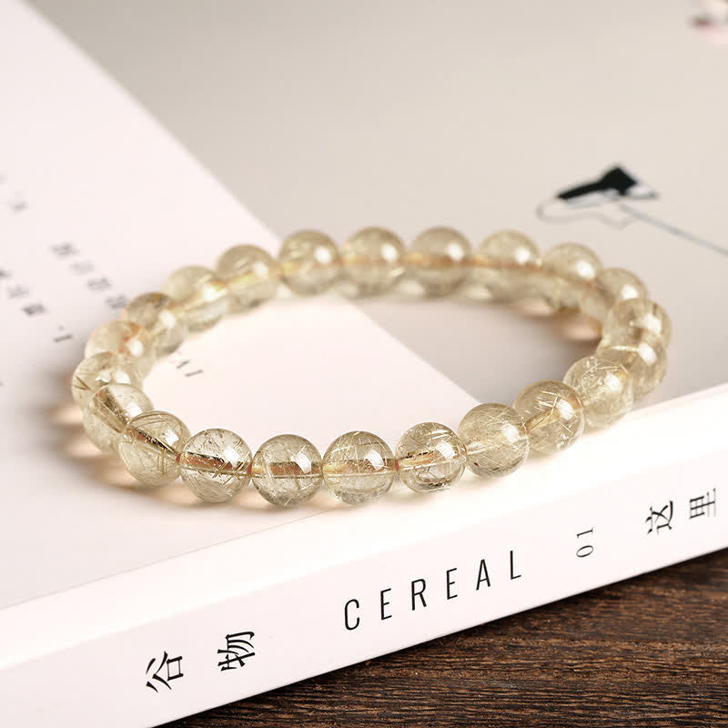 Bracelet de protection et de bonne augure en quartz rutile naturel Buddha Stones - image 1