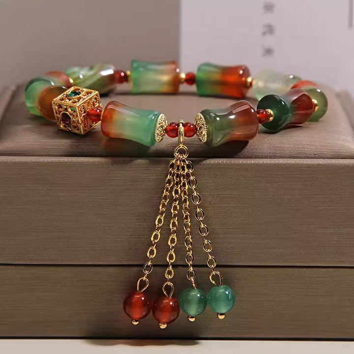 Buddha Stones Bracelet courageux en perles de bambou et agate paon colorée, pompon - Agate Paon (Tour de poignet 14-16 cm) - image 0