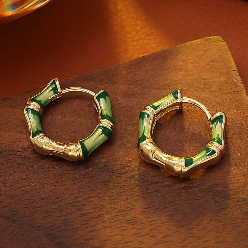 Buddha Stones Boucles d'oreilles créoles en cuivre avec motif bambou ruisselant et porte-bonheur - image 1