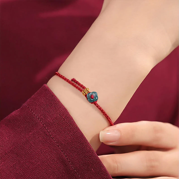 Buddha Stones Bracelet porte-bonheur en cuivre avec pièce de jade et cordon rouge - image 4