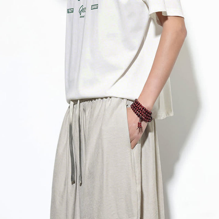 Buddha Stones Pantalon harem court en coton uni pour homme, avec cordon de serrage et poches, couleur printemps - image 17