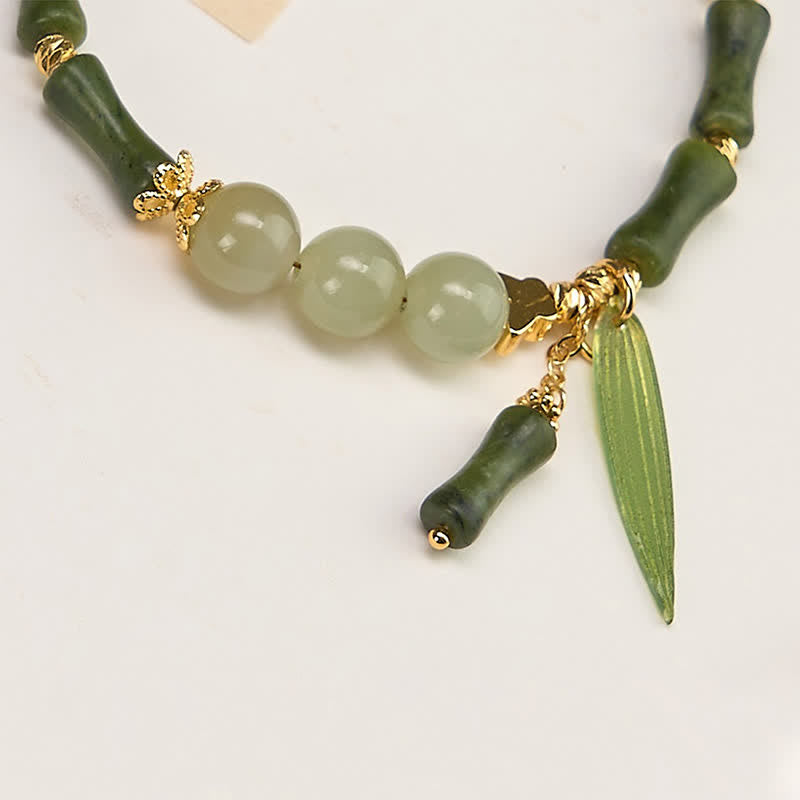 Buddha Stones Bracelet de paix en perles de jade Hetian, péridot et bambou, orné de papillons et de péridots. - image 2