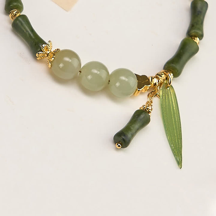 Buddha Stones Bracelet de paix en perles de jade Hetian, péridot et bambou, orné de papillons et de péridots. - image 2