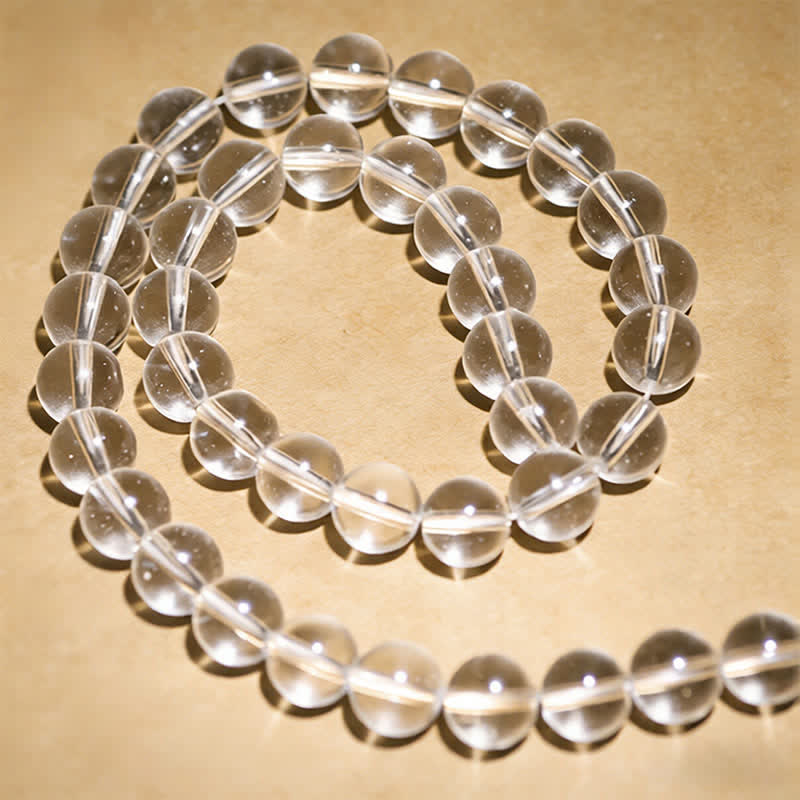 Buddha Stones Mala de protection composé de 108 perles de quartz clair - image 10