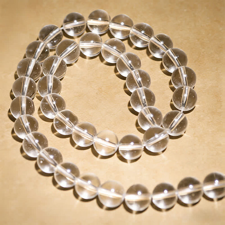 Buddha Stones Mala de protection composé de 108 perles de quartz clair - image 10