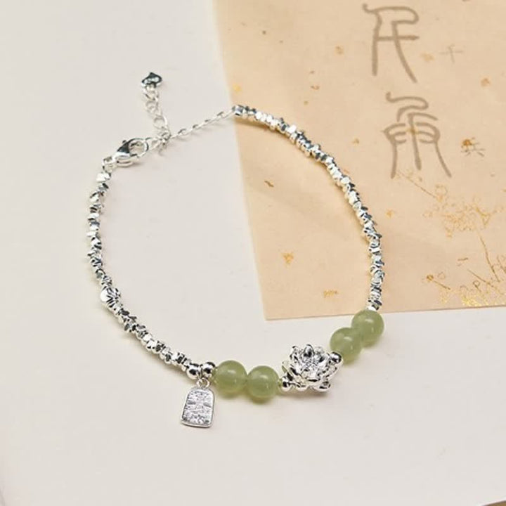 Buddha Stones Bracelet en cuivre orné de perles de jade lotus et de perles de joie et de bonheur, symbole d'abondance. - Lotus (Tour de poignet 15-18 cm) - image 0