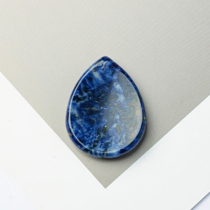 Buddha Stones Pierre anti-stress en forme de larme, cristal décoratif de protection, 34 x 26 x 7,8 cm - Sodalite naturelle (la couleur peut varier) - 34*26*7,8 mm - image 11