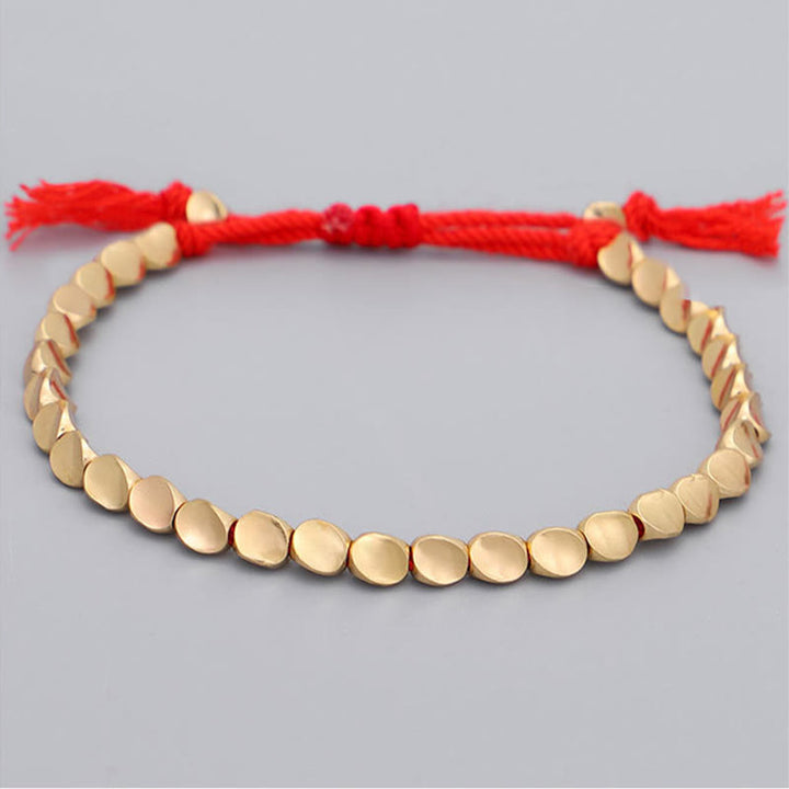 Buddha Stones Bracelet porte-bonheur composé de 3 perles en cuivre doré et d'un fil rouge - image 2
