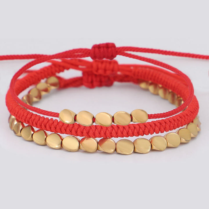 Buddha Stones Bracelet porte-bonheur composé de 3 perles en cuivre doré et d'un fil rouge - Cordon rouge (Tour de poignet : 16-26 cm) - image 0